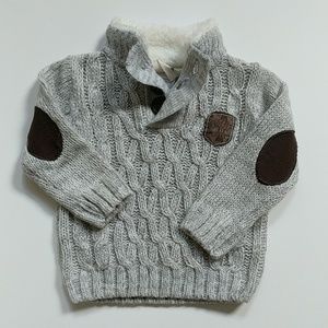 Cable knit sweater with elbow patches